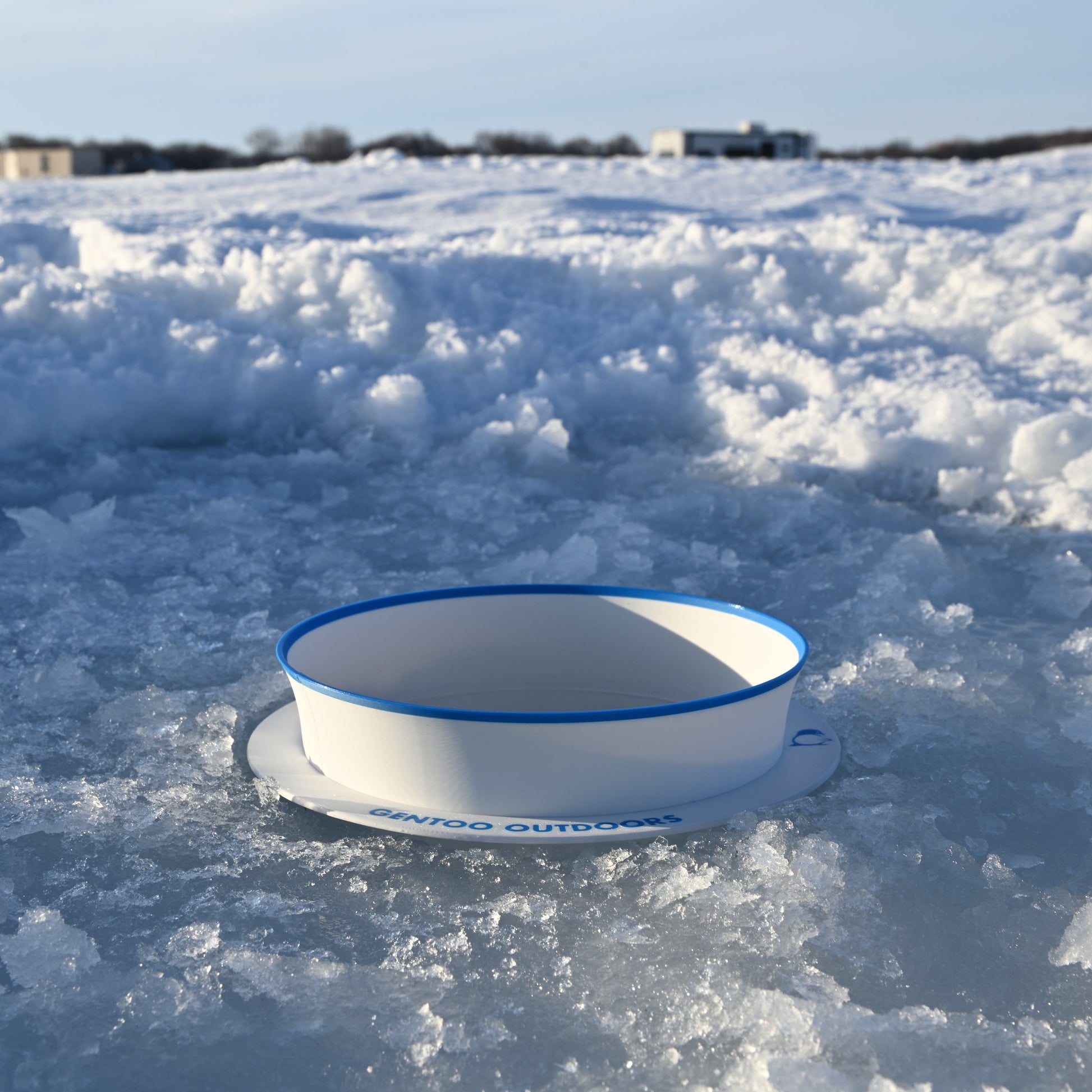 GearGuard on ice with fish houses in background