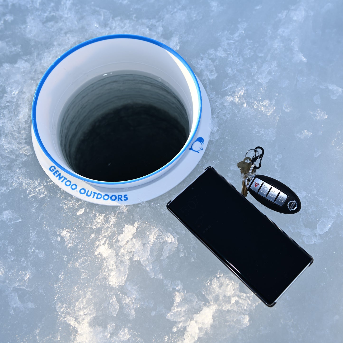 GearGuard with phone and keys on ice